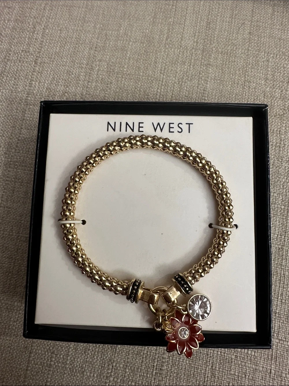 Nine West Gold Braided Bracelet with Red Flower Charm and Clear Crystal, NWOT